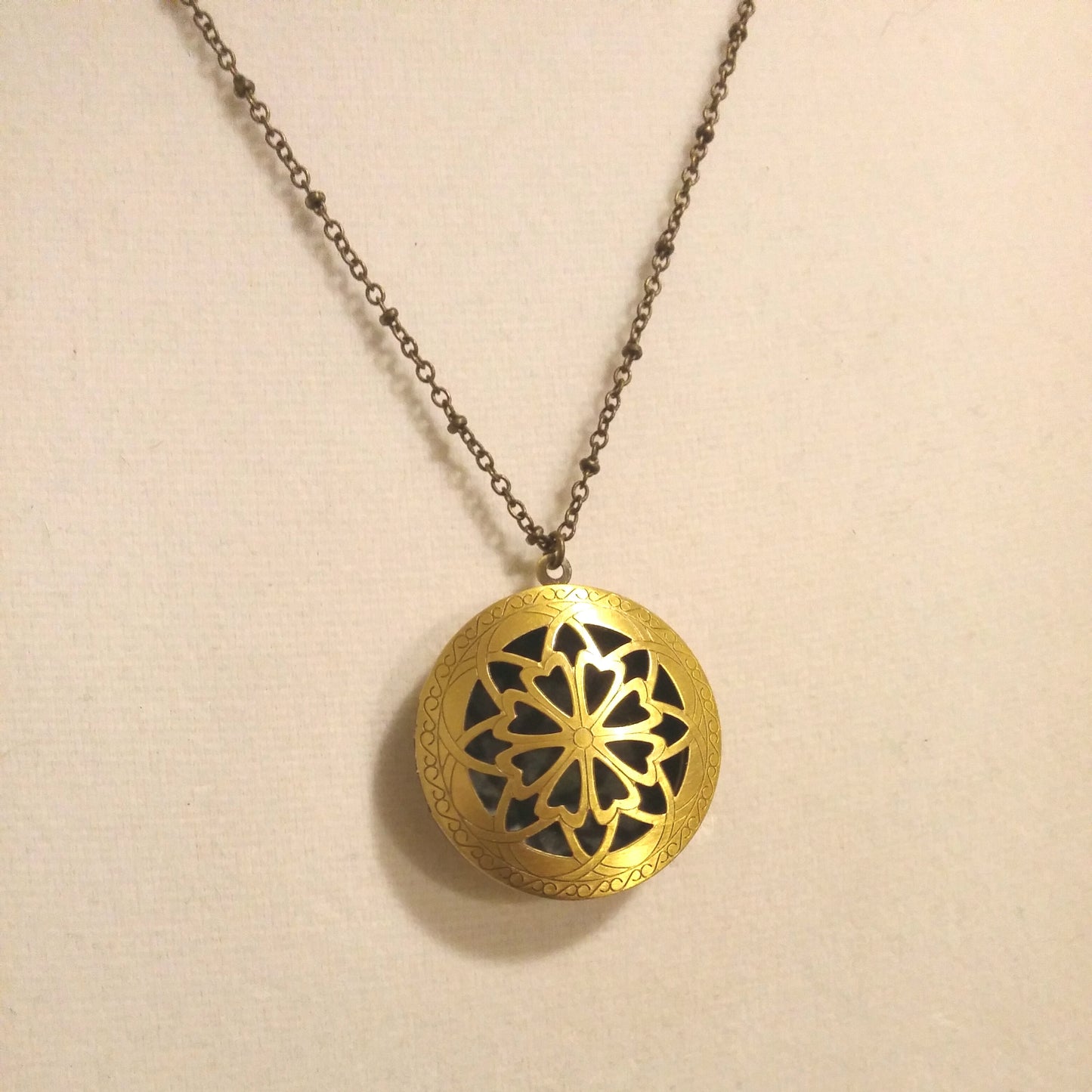 CUTOUT FLOWER COIN LOCKET AND AROMATHERAPY DIFFUSER-NECKLACES-JipsiJunk-JipsiJunk