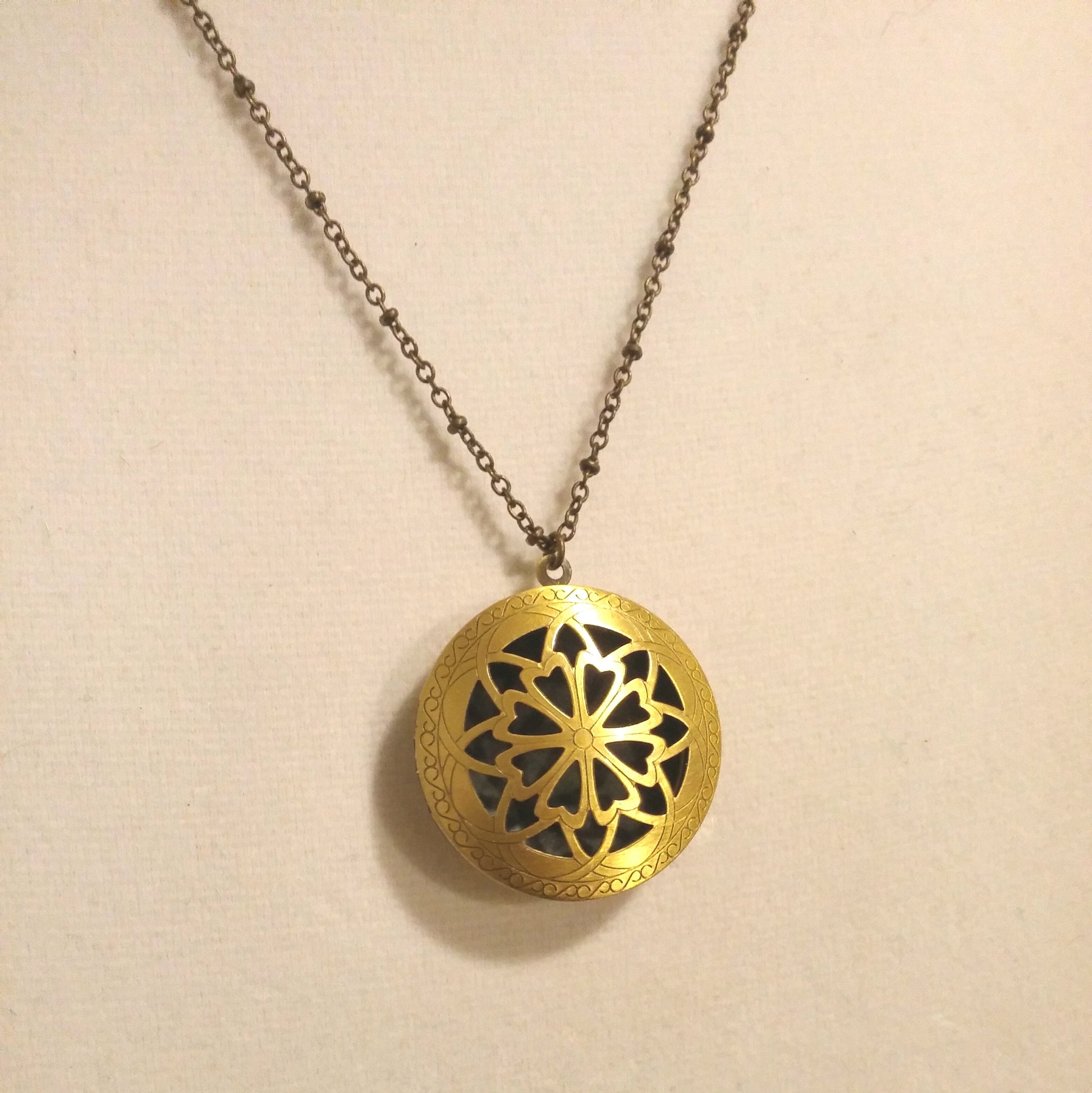 CUTOUT FLOWER COIN LOCKET AND AROMATHERAPY DIFFUSER-NECKLACES-JipsiJunk-JipsiJunk